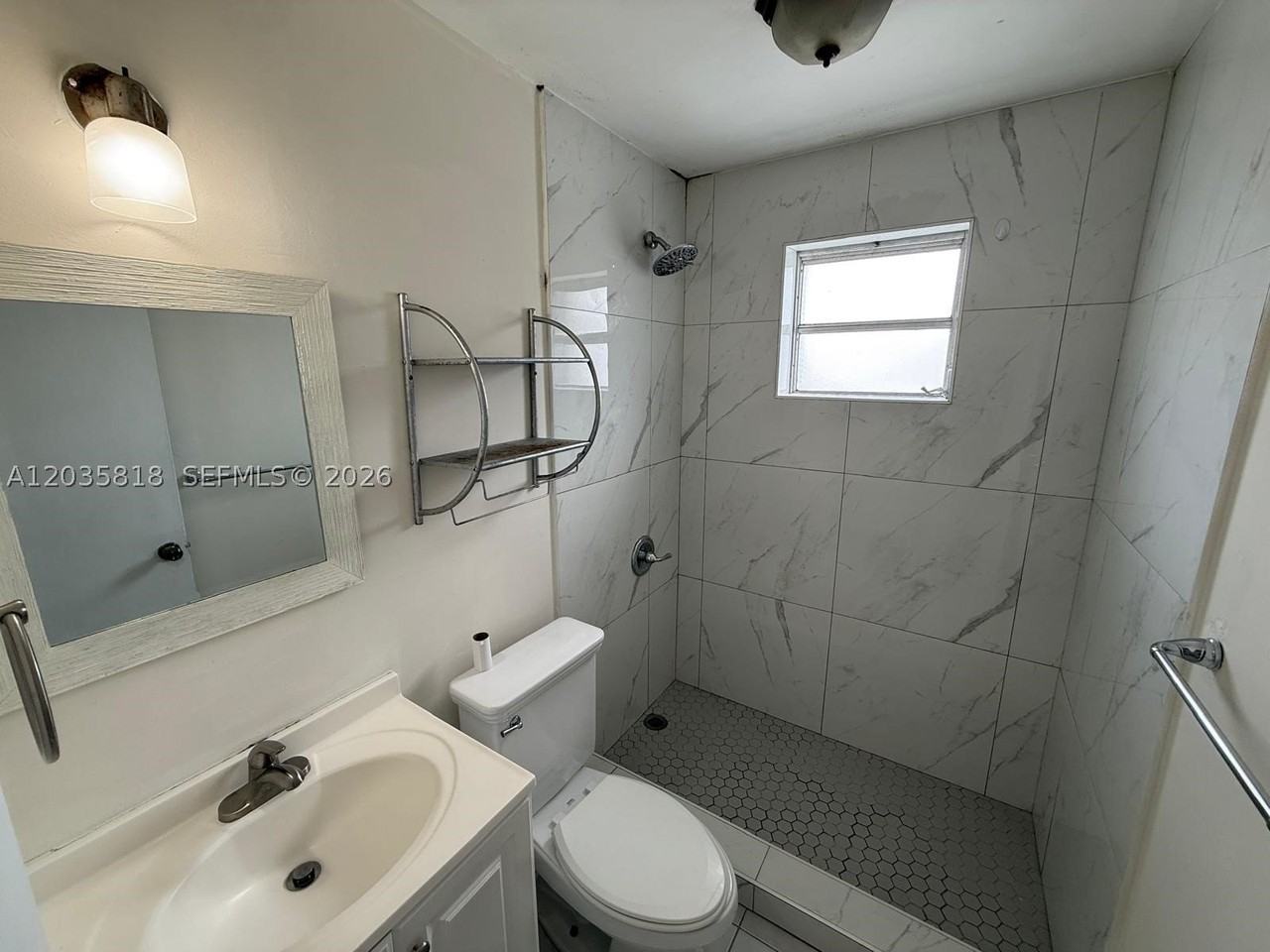 1285 W 26th Pl #204 - Photo 3 of 7