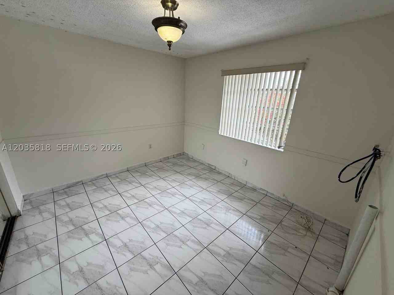 1285 W 26th Pl #204 - Photo 4 of 7