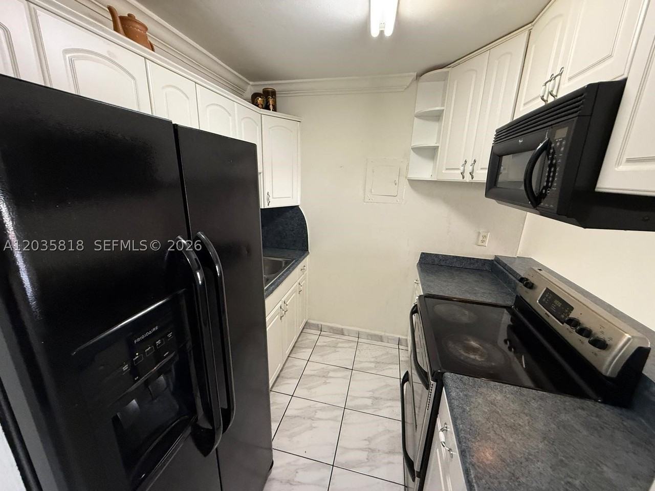 1285 W 26th Pl #204 - Photo 7 of 7