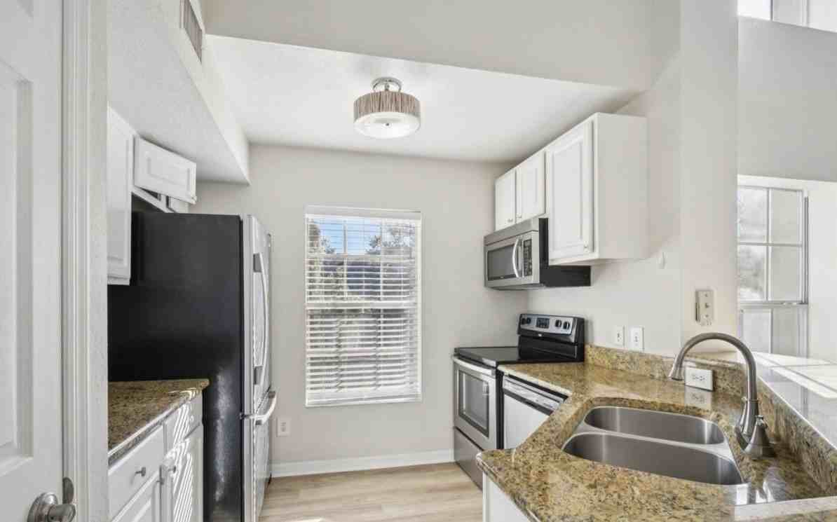 13700 Richmond Park Dr N #1 - Photo 5 of 16