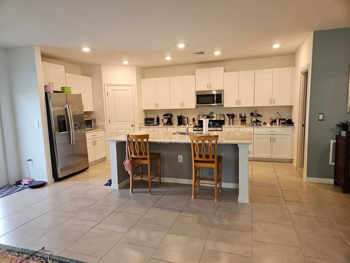 12210 Dakota Ridge Pl - Photo 2 of 10
