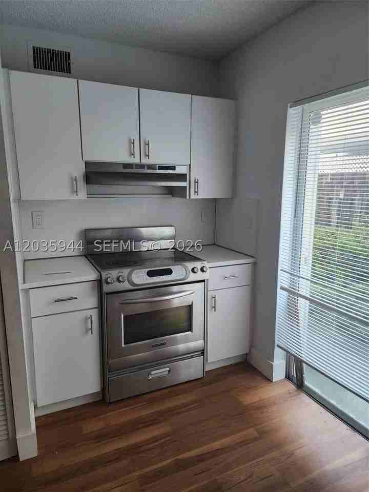 10019 W Okeechobee Rd #102 - Photo 6 of 11