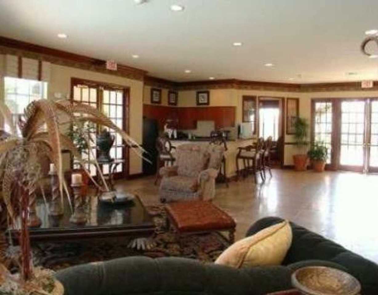 5005 Wiles Rd - Photo 2 of 12