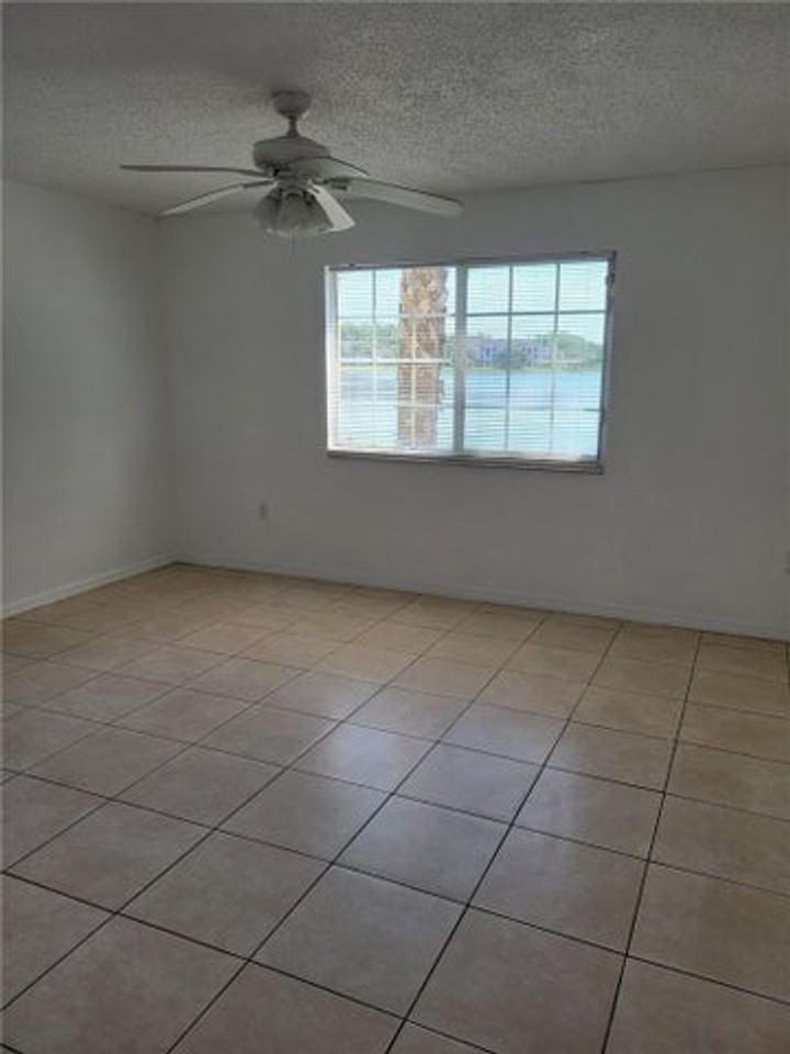 5005 Wiles Rd - Photo 6 of 12