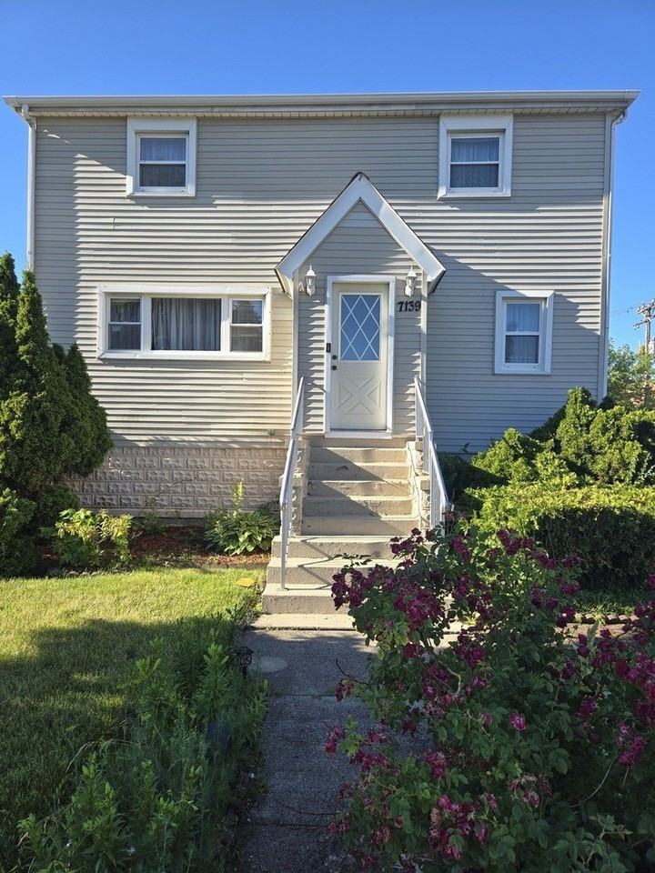 7139 W 74th Pl - Photo 2 of 31