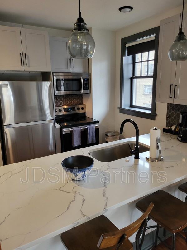 630 E 16th Ave #202 - Photo 2 of 17