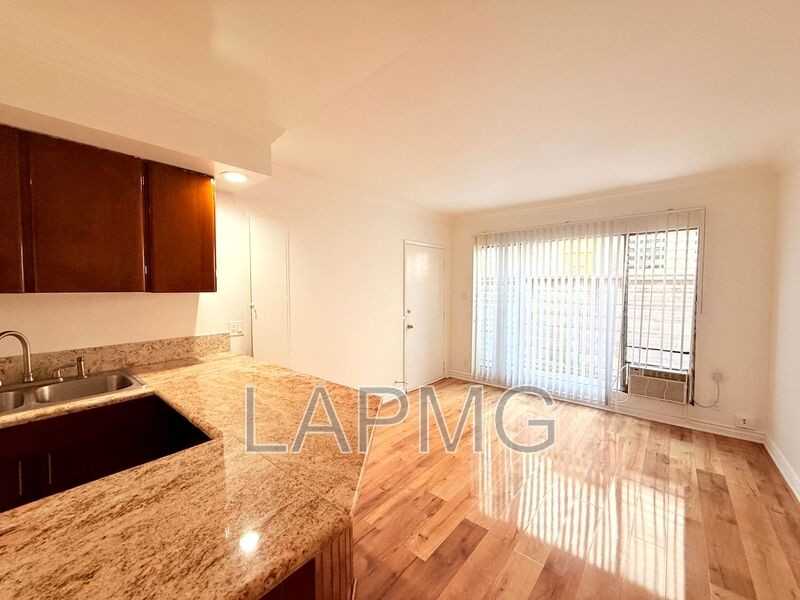 1266 N Serrano Ave #2 - Photo 6 of 16