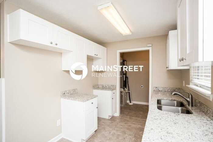 5120 Highpoint Rd - Photo 5 of 15