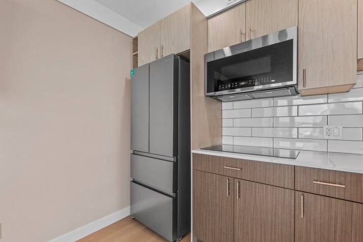 Utilities Included! Penthouse Bachelor Suites! - Photo 3 of 21