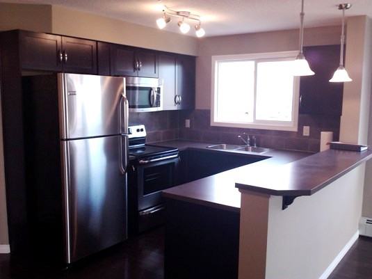 31 Country Village Manor Ne - Photo 2 of 10
