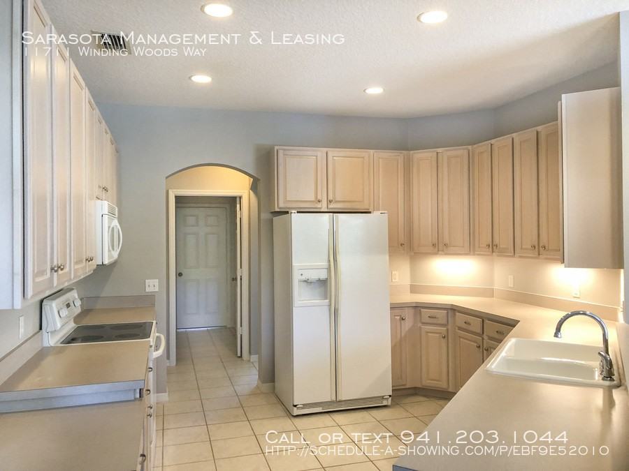 11711 Winding Woods Way - Photo 3 of 16