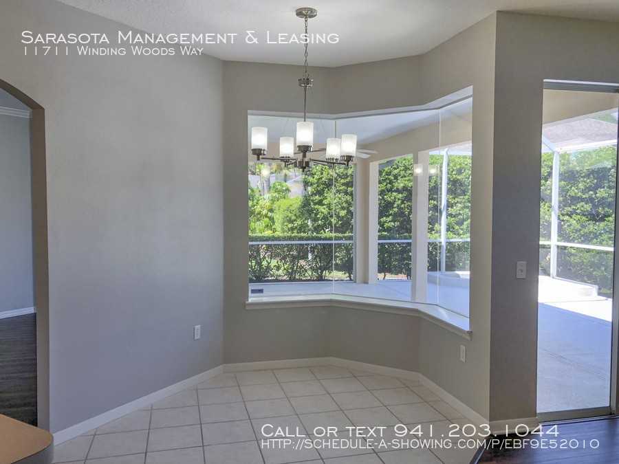 11711 Winding Woods Way - Photo 5 of 16