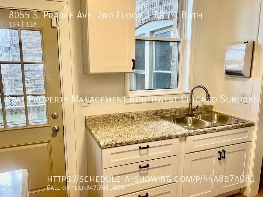 8055 S Prairie Ave Fl 1 - Photo 3 of 11