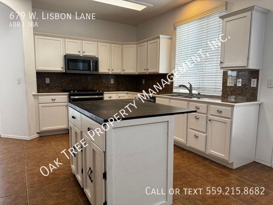 679 W Lisbon Ln - Photo 2 of 18