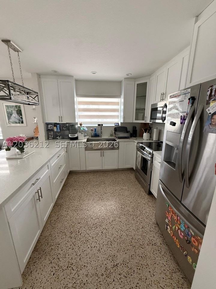 875 W 72nd Pl #875 - Photo 3 of 20