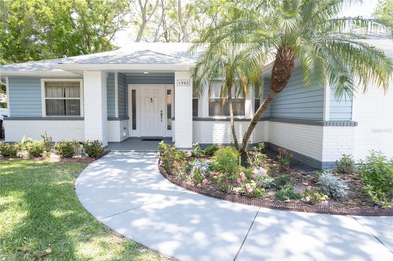 6908 Arbor Oaks Cir - Photo 2 of 49