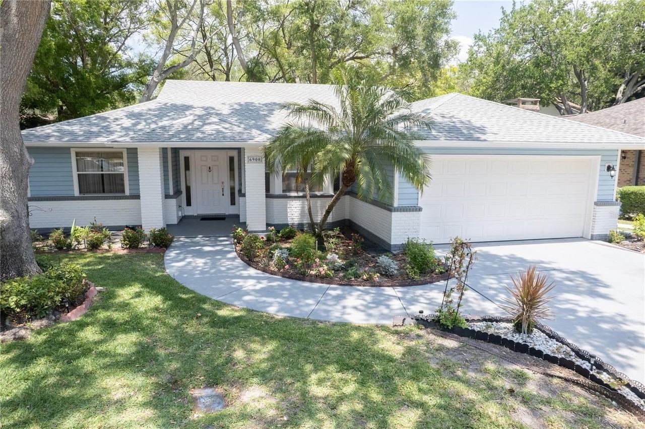 6908 Arbor Oaks Cir - Photo 3 of 49