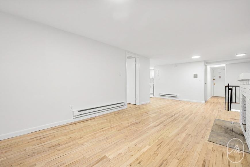 313 W 29th St - Photo 3 of 10