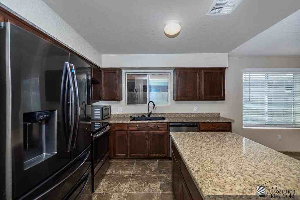 7120 E 36th Pl - Photo 6 of 26