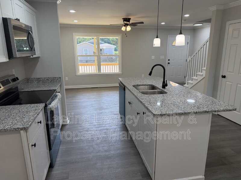 2036 Harrison Ave - Photo 5 of 34