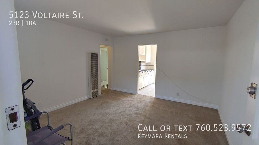5123 Voltaire St - Photo 5 of 28