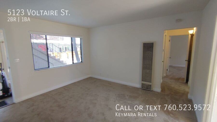 5123 Voltaire St - Photo 7 of 28
