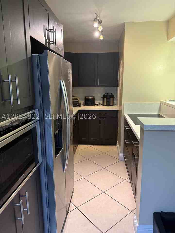 7405 Sw 152nd Ave #3-107 - Photo 2 of 9