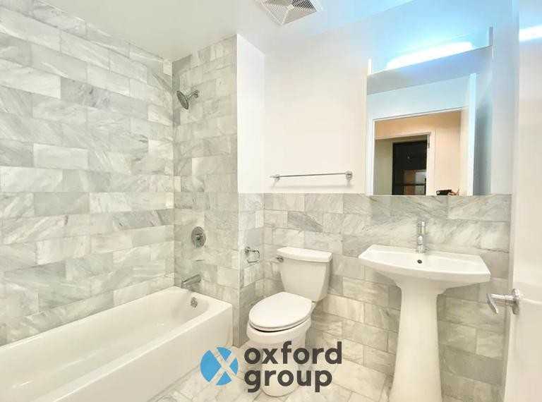 215 E 12th St - Photo 5 of 6