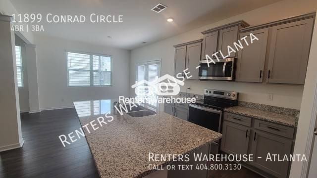 11899 Conrad Cir - Photo 2 of 26