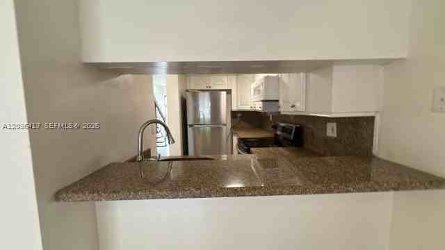 5388 W 24th Ave #110 - Photo 4 of 22
