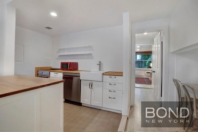233 E 18th St - Photo 6 of 10