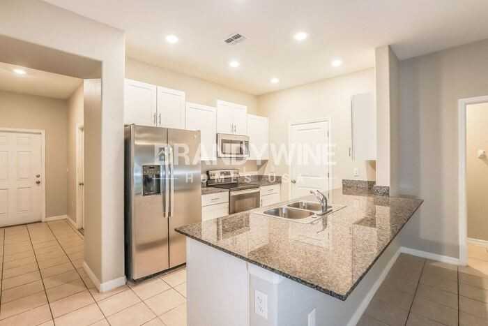 14236 Riva Ridge Pl - Photo 7 of 39