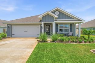 289 Gray Owl Dr W - Photo 1 of 1