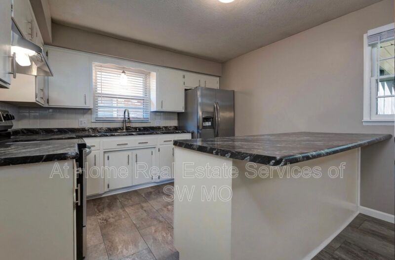2425 S Dollison Ave - Photo 4 of 13