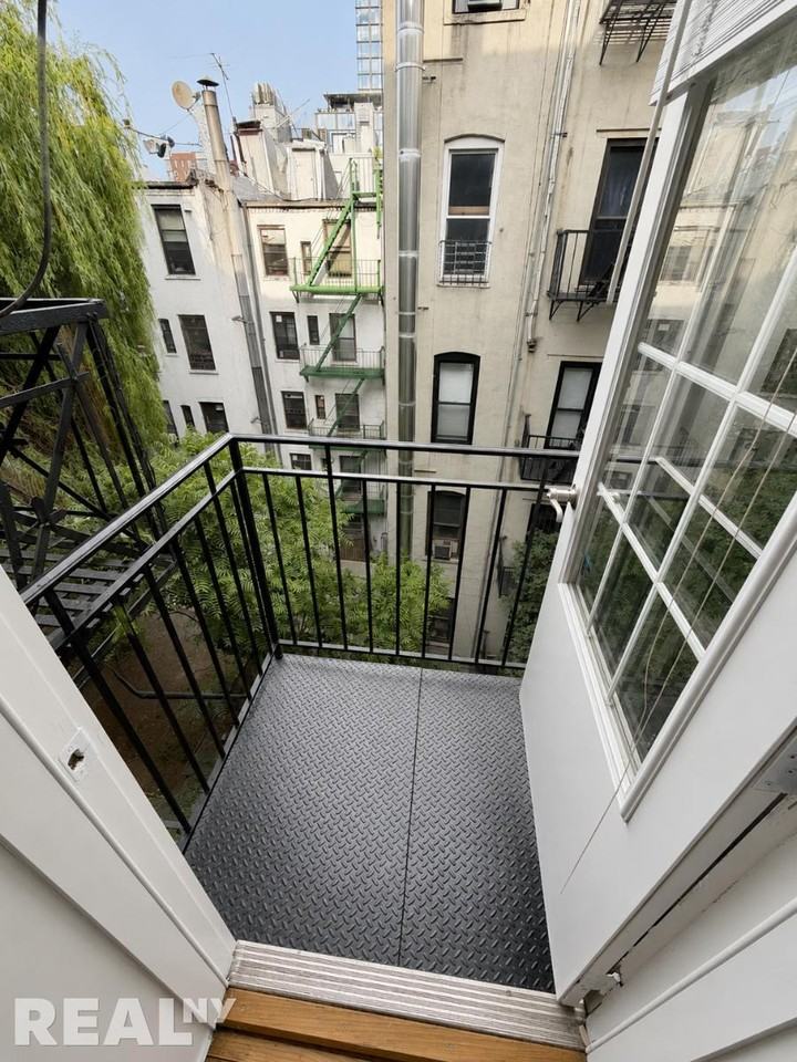 Mott St #19 - Photo 2 of 7