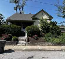 featured image of 215 E 9th St