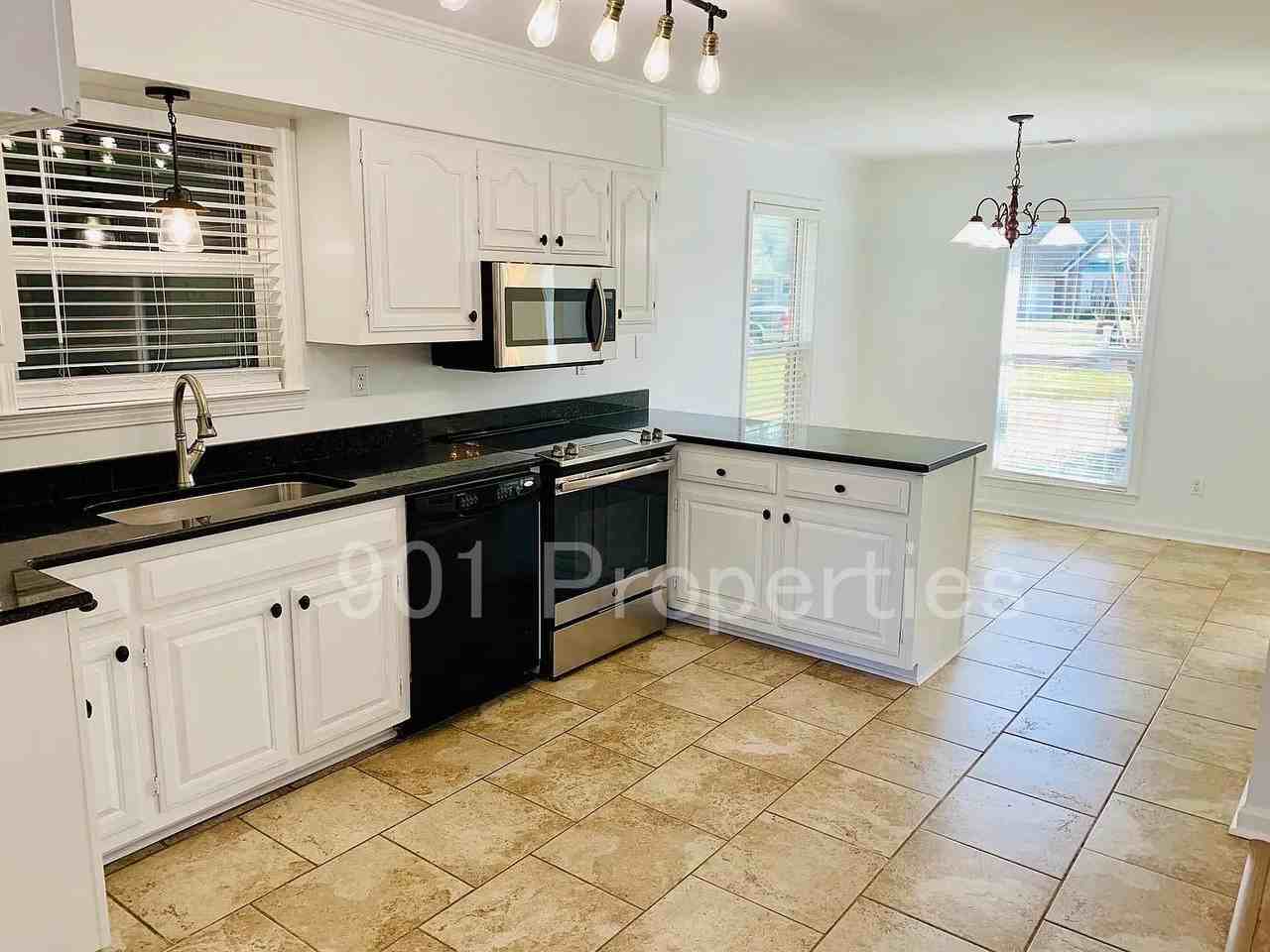 1602 Bubbling Brook Dr #1 - Photo 4 of 15