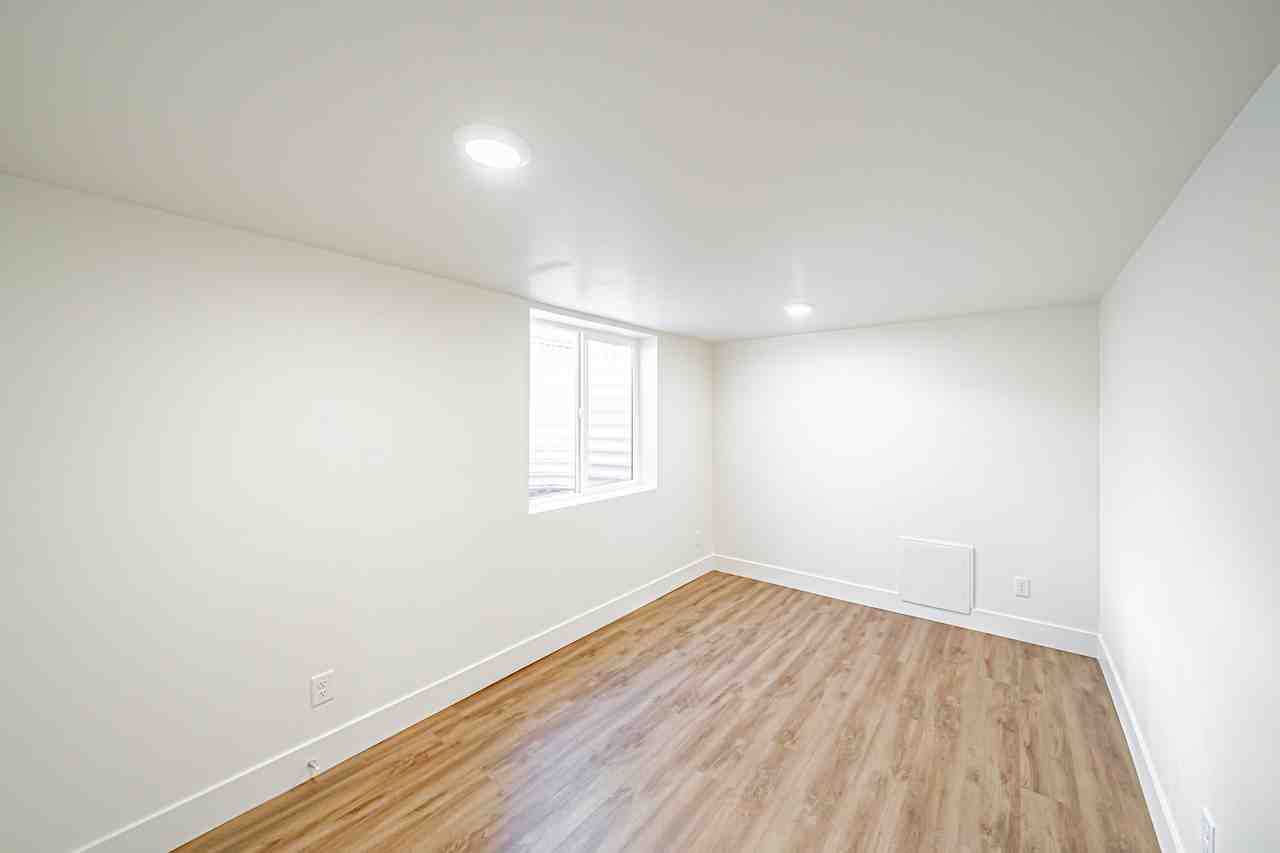 303 W 20th St Bsmt 1 - Photo 6 of 12