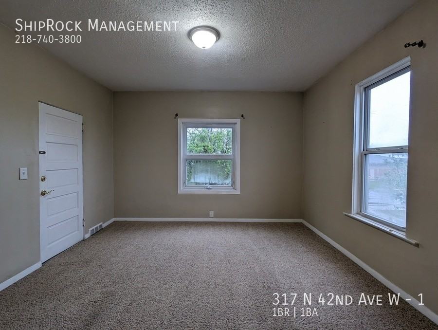 317 N 42nd Ave W #1 - Photo 2 of 13