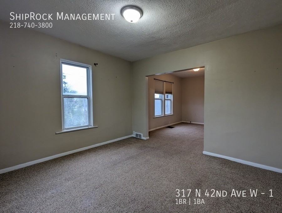 317 N 42nd Ave W #1 - Photo 3 of 13
