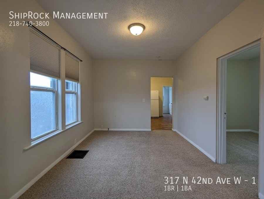 317 N 42nd Ave W #1 - Photo 4 of 13