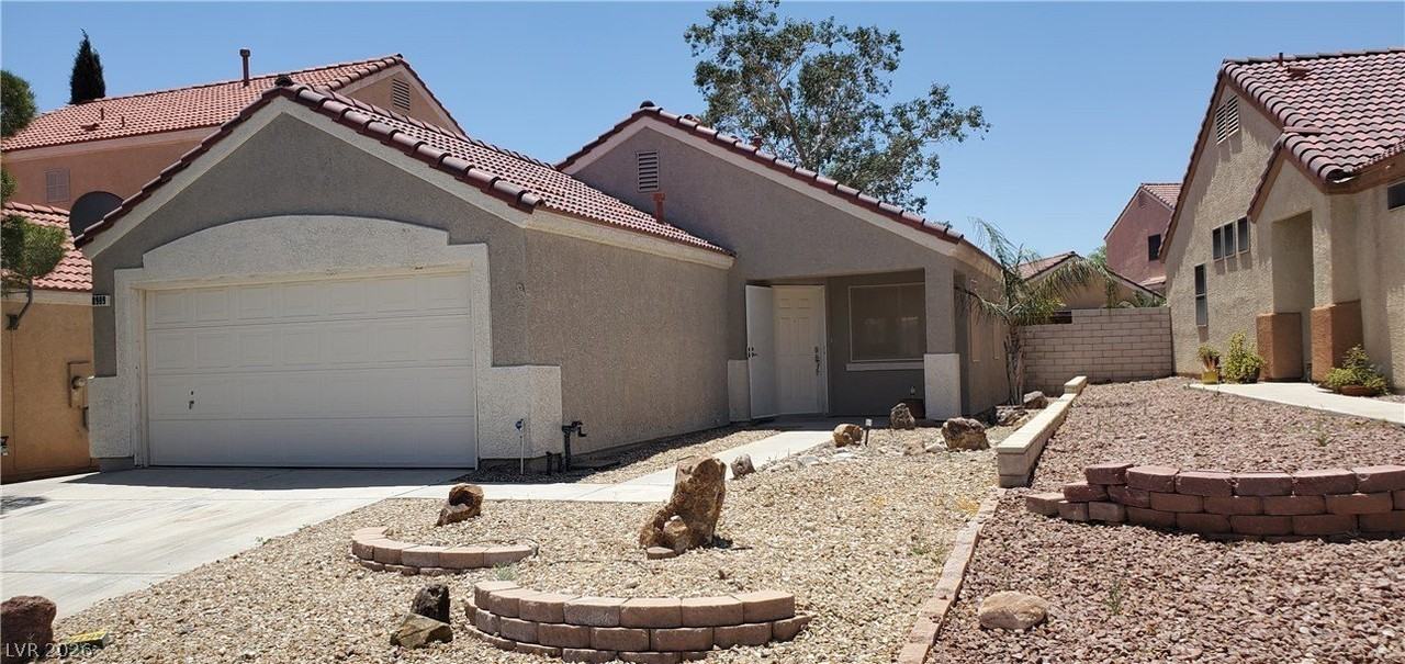 8909 Colorful Pines Ave - Photo 2 of 25