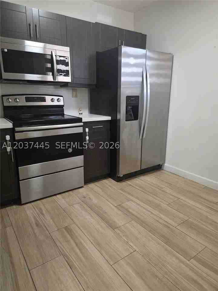 15711 Sw 137th Ave #101 - Photo 3 of 24