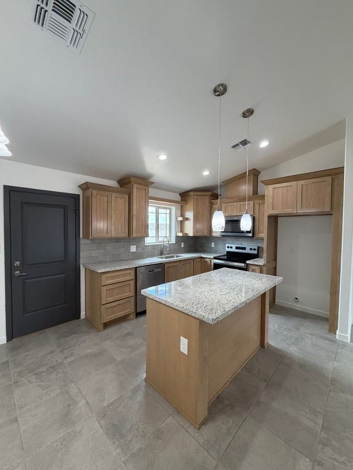 10643 E 46th Ln - Photo 6 of 26