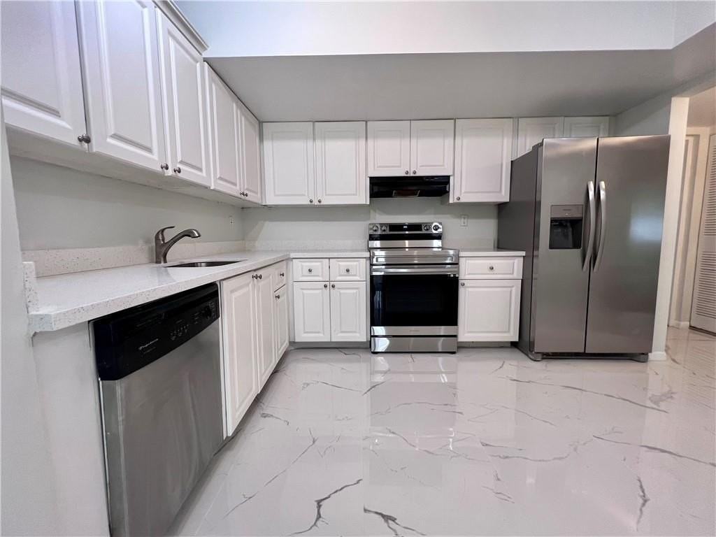 701 N Pine Island Rd #303 - Photo 2 of 20