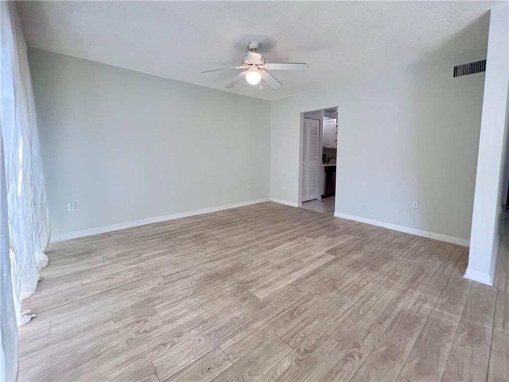 701 N Pine Island Rd #303 - Photo 3 of 20