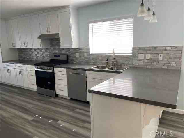 7711 Van Noord Ave - Photo 4 of 7