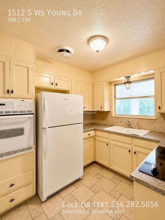 1512 S W S Young Dr - Photo 4 of 12