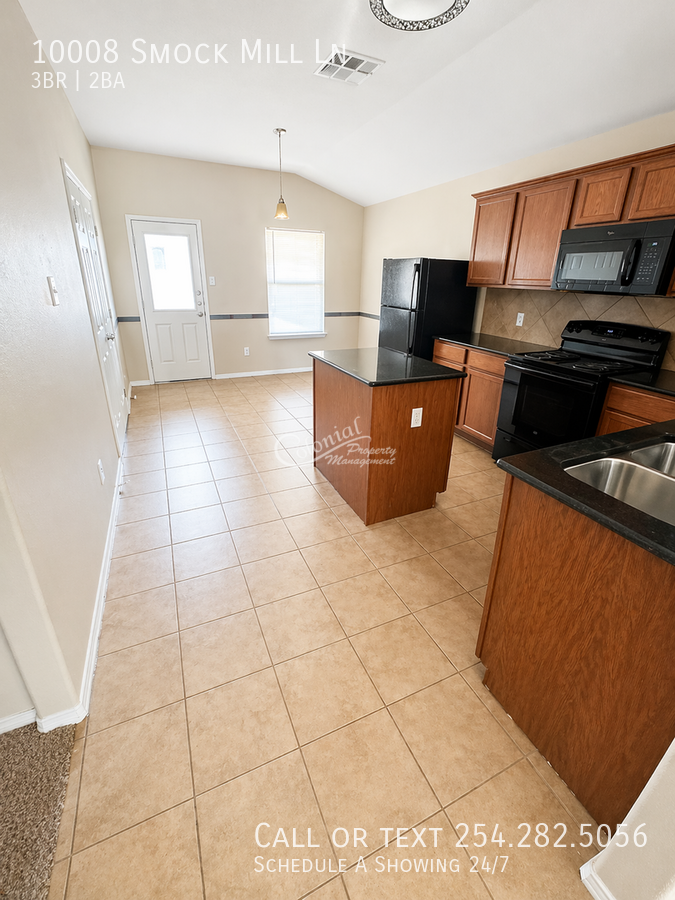 10008 Smock Mill Ln - Photo 3 of 15