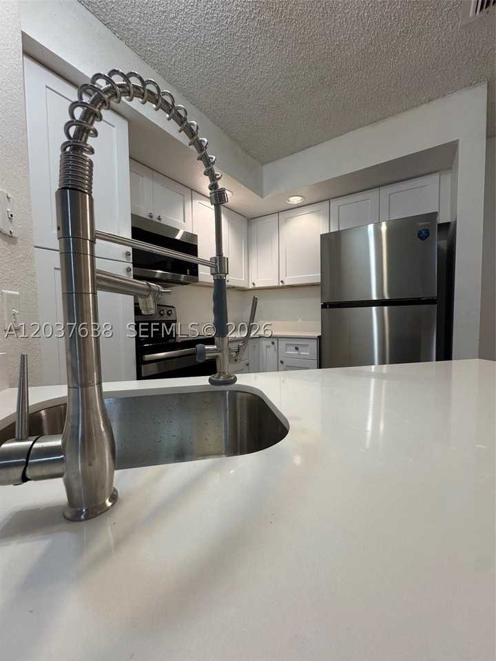 3390 Pinewalk Dr N #1016 - Photo 2 of 4